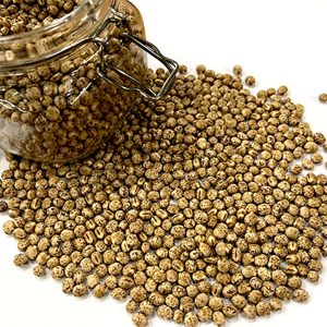 Dry green peas  on a white background